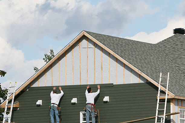 Professional Siding technician working in Roanoke, TX